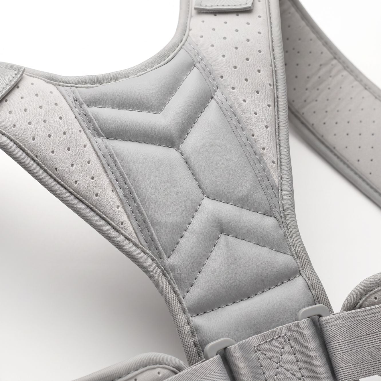 Close-up of the flat back pad and adjustable buckle on the gray ExoPosture Air posture corrector. gray-air1 gray-air2 gray-air3 gray-air4 gray-air5