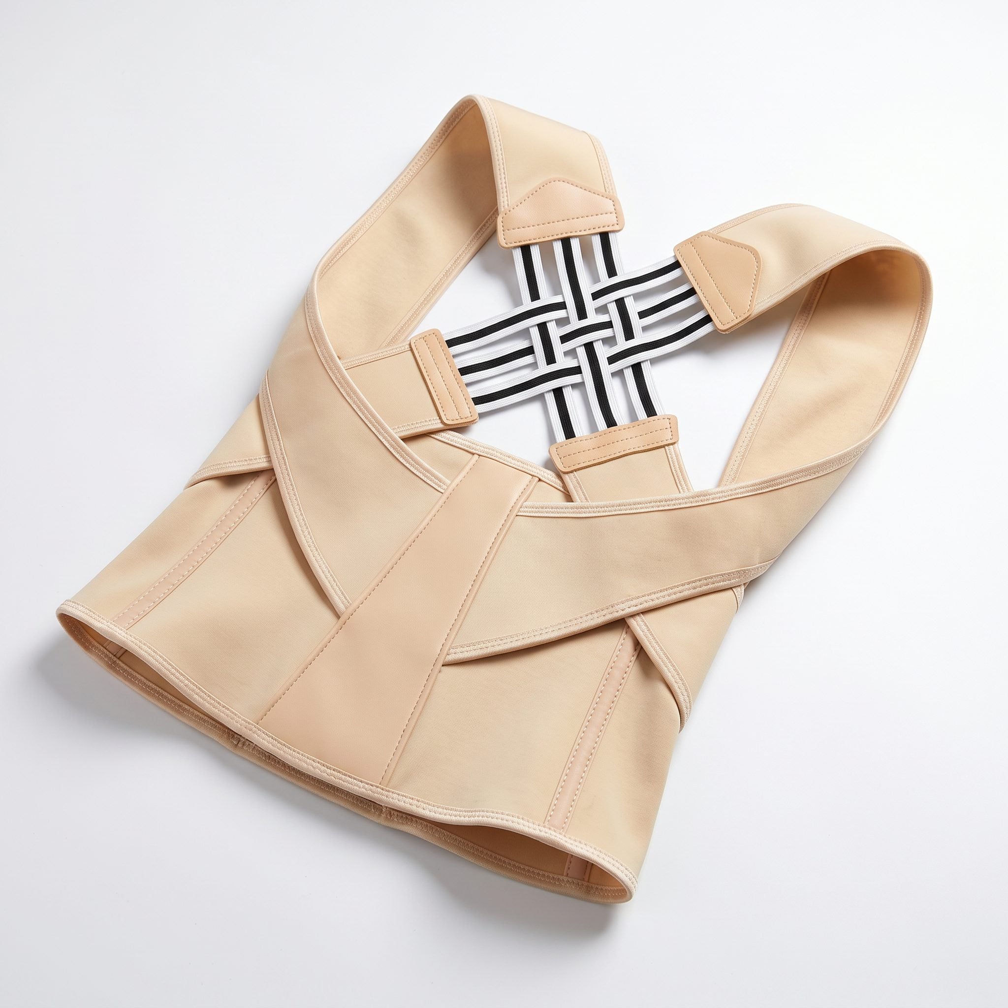 Beige posture corrector back brace laid flat. beige-exo1 beige-exo2 beige-exo3 beige-exo4 beige-exo5 beige-exo6