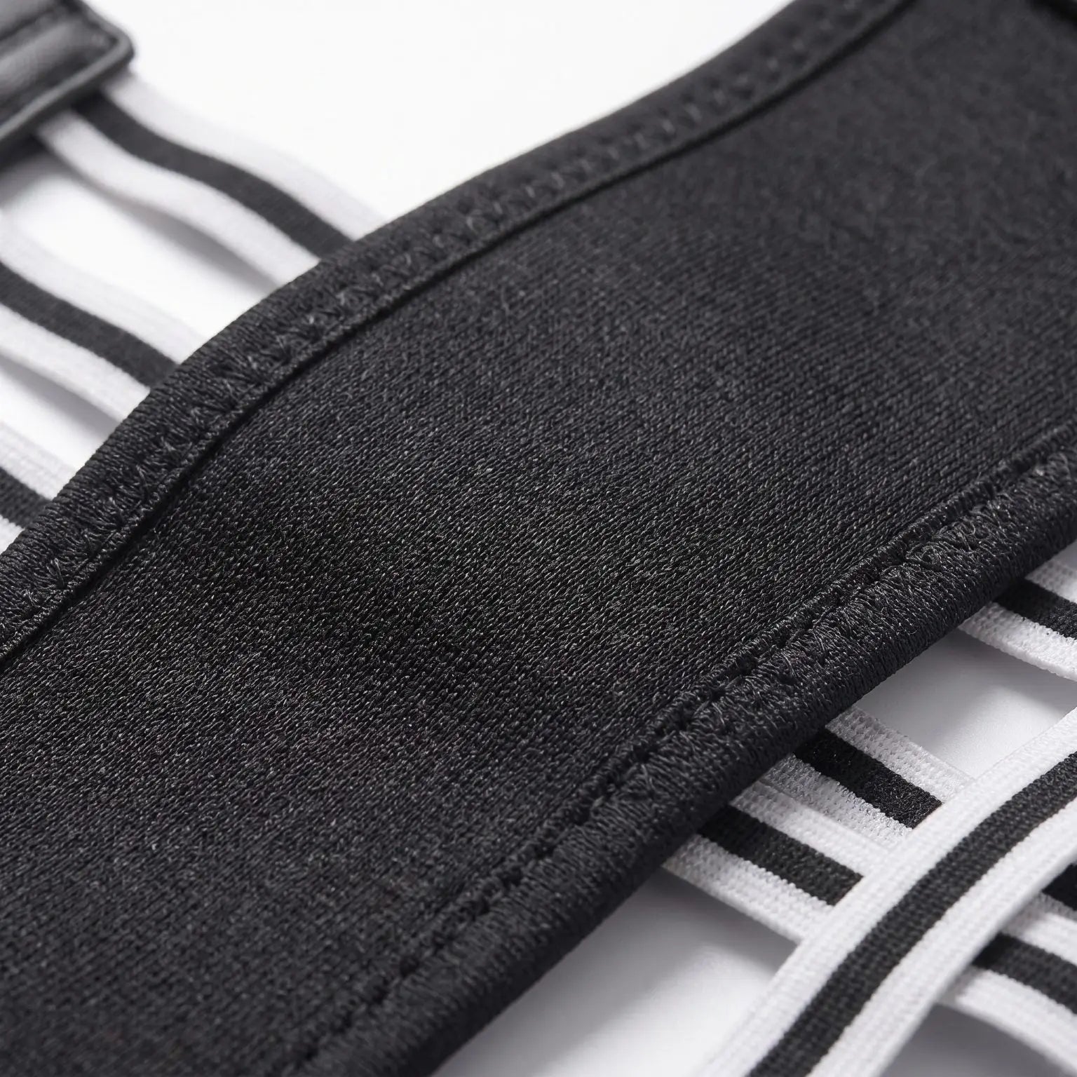Fabric texture of black posture corrector. black-exo1 black-exo2 black-exo3 black-exo4 black-exo5 black-exo6
