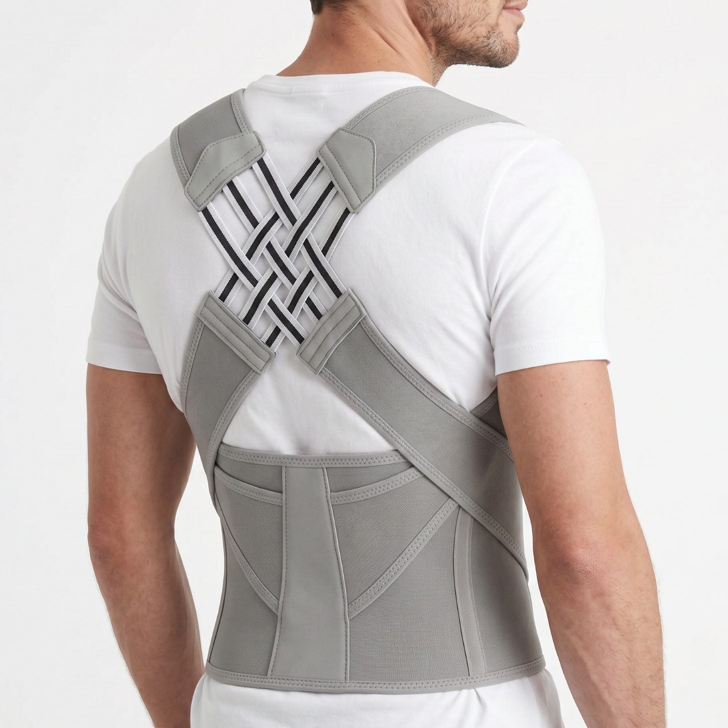 Gray posture corrector on male model, three quarter back view. gray-exo1 gray-exo2 gray-exo3 gray-exo4 gray-exo5 gray-exo6